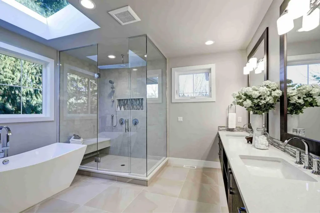 Professional bathroom remodel with modern shower, vanity, and lighting upgrades