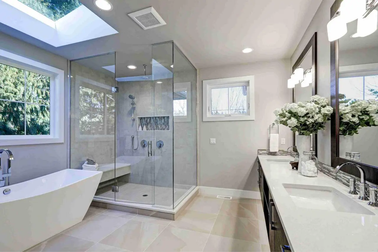 Professional bathroom remodel with modern shower, vanity, and lighting upgrades