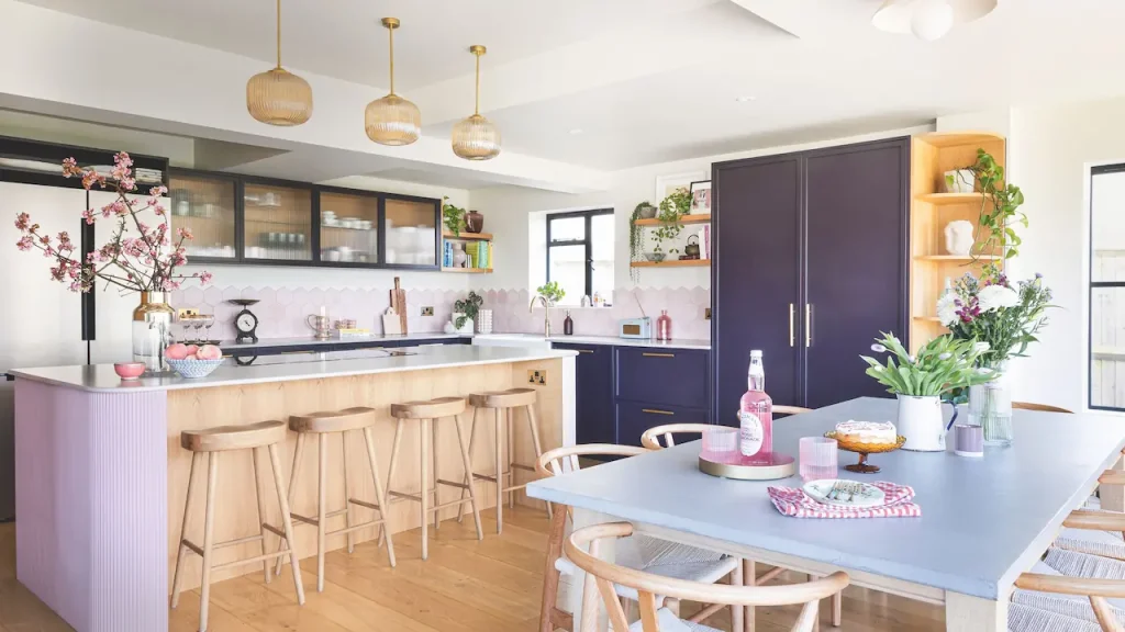 Open small kitchen layout with modern storage and functional dining space